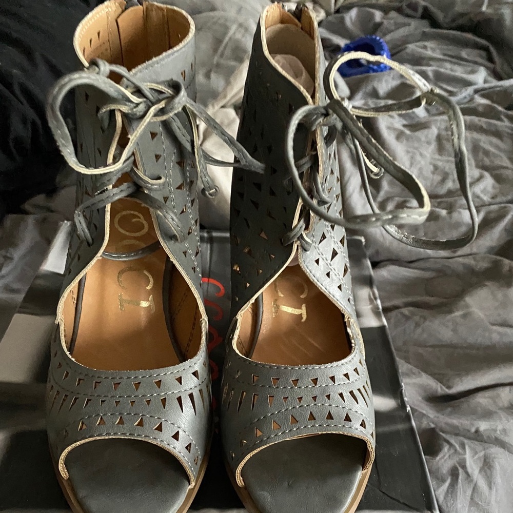 Grey wedge open toed shoes